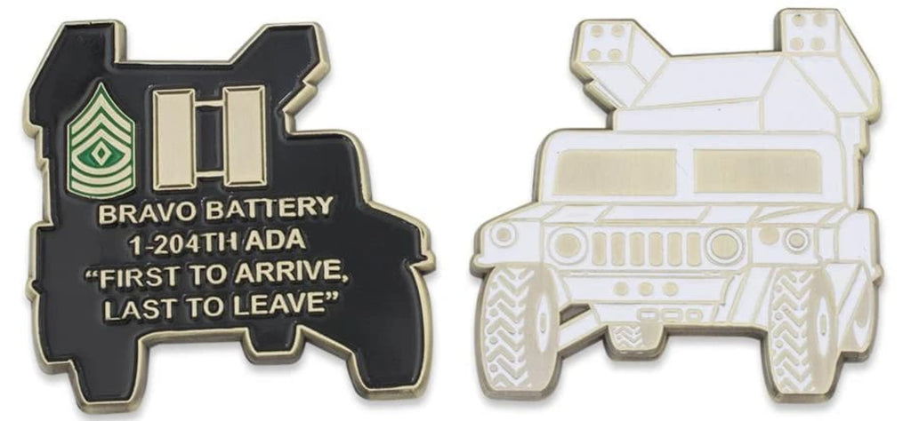 A challenge coin shaped like an armored vehicle