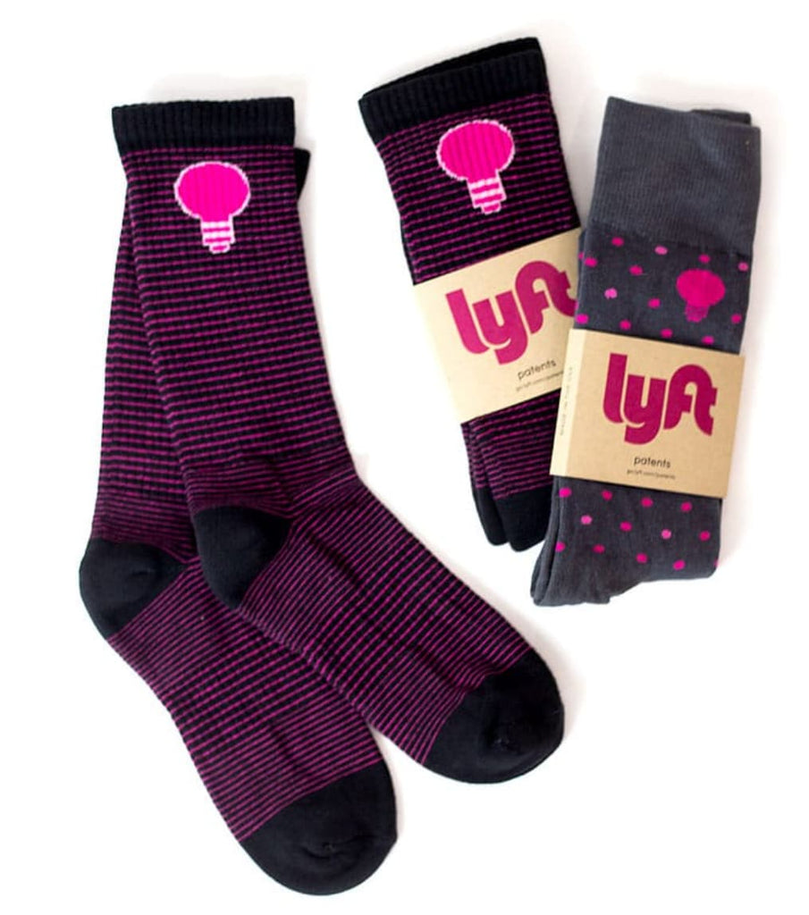 Swag socks with the Lyft logo 