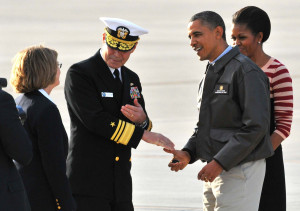 Former President Obama hands out a challenge coin