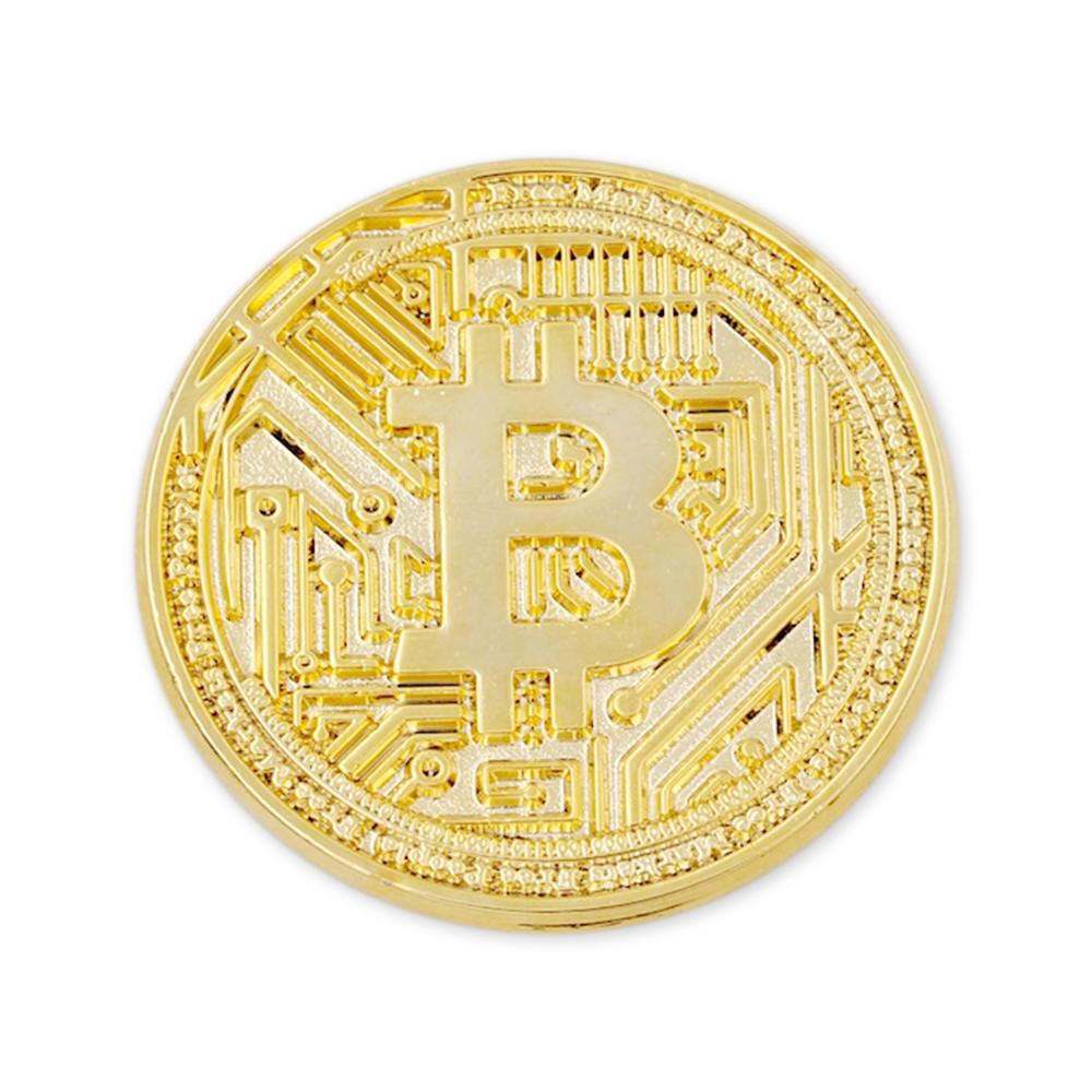 gold metal coin with bitcoin logo