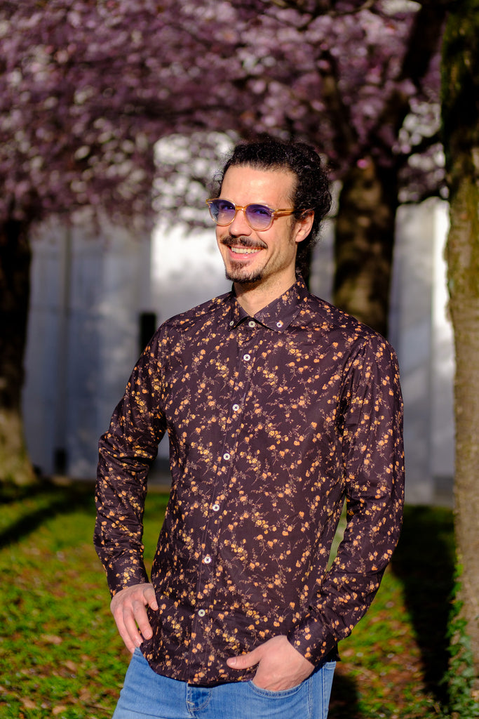 Vintage-inspired Liberty of London fabric shirt with colorful floral print, handmade in Switzerland. Limited edition of 30 pieces, available in men's slim fit, women's boxy fit, or custom-made. Silky-smooth and luxurious to the touch