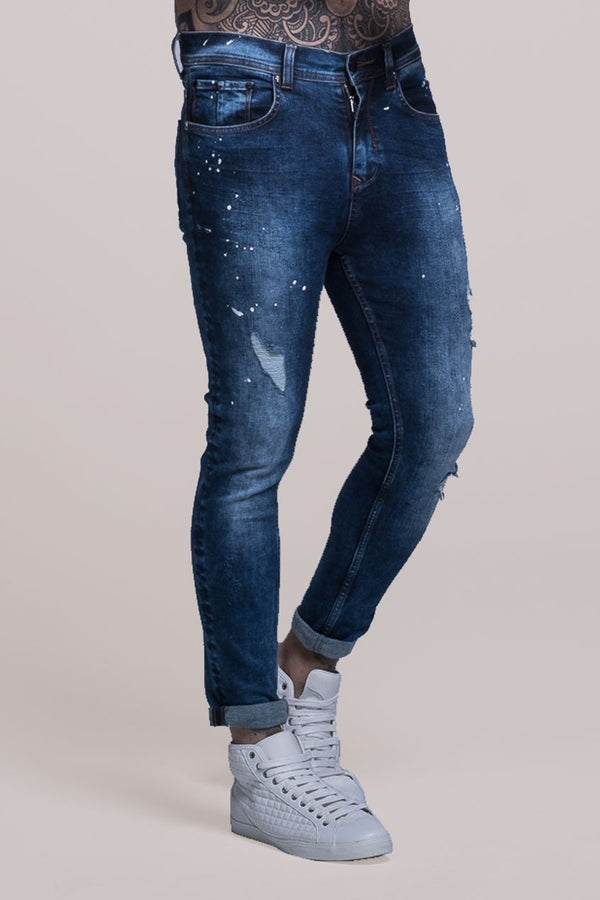 splatter ripped jeans