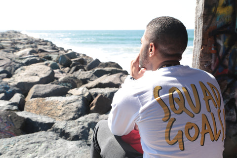 Contemplating questions on Mission Beach in San Diego