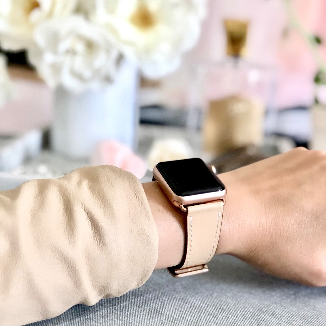 Juxli Home Blush Pink Single Tour Apple Watch Leather Band on Woman in Bedroom