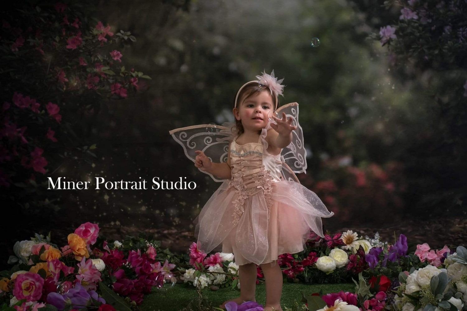 photo of a little girl with Kate Pink Florals Garden Fairy Lights spring Backdrop for Photography Designed by Pine Park Collection