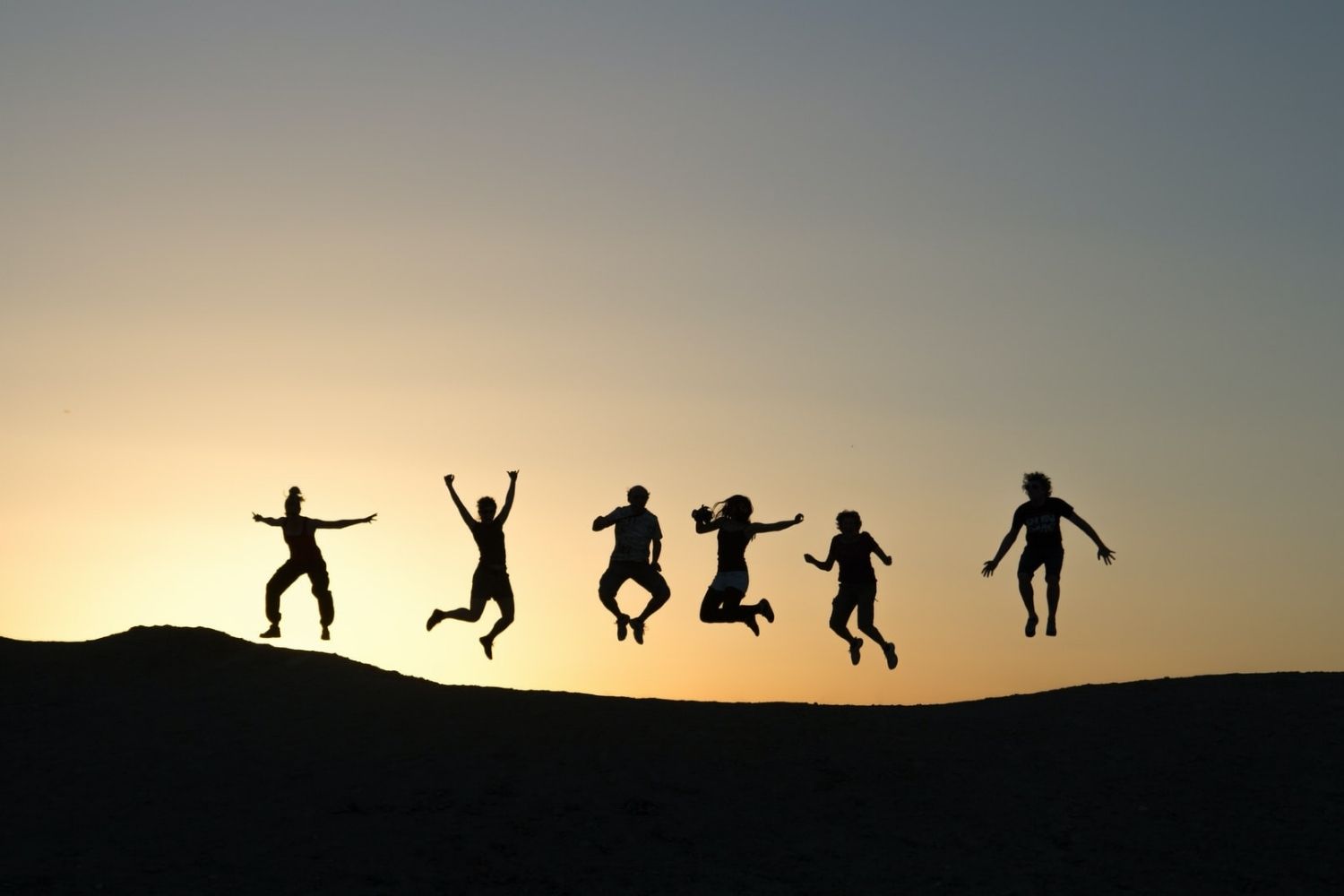 photo of Group jumps into the air