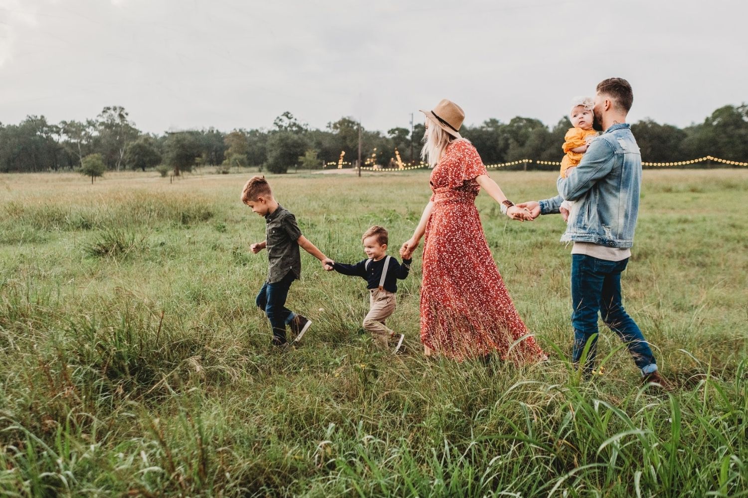 family photo by walking together hand in hand