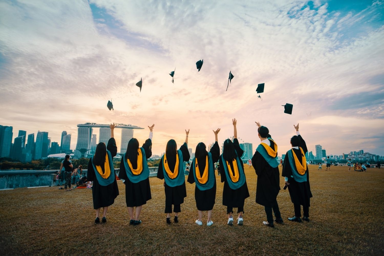 group photo of  students throw their crowns