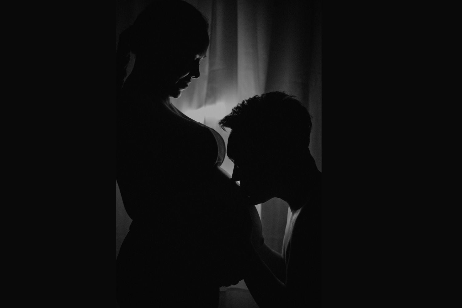 maternity photo of a black silhouette