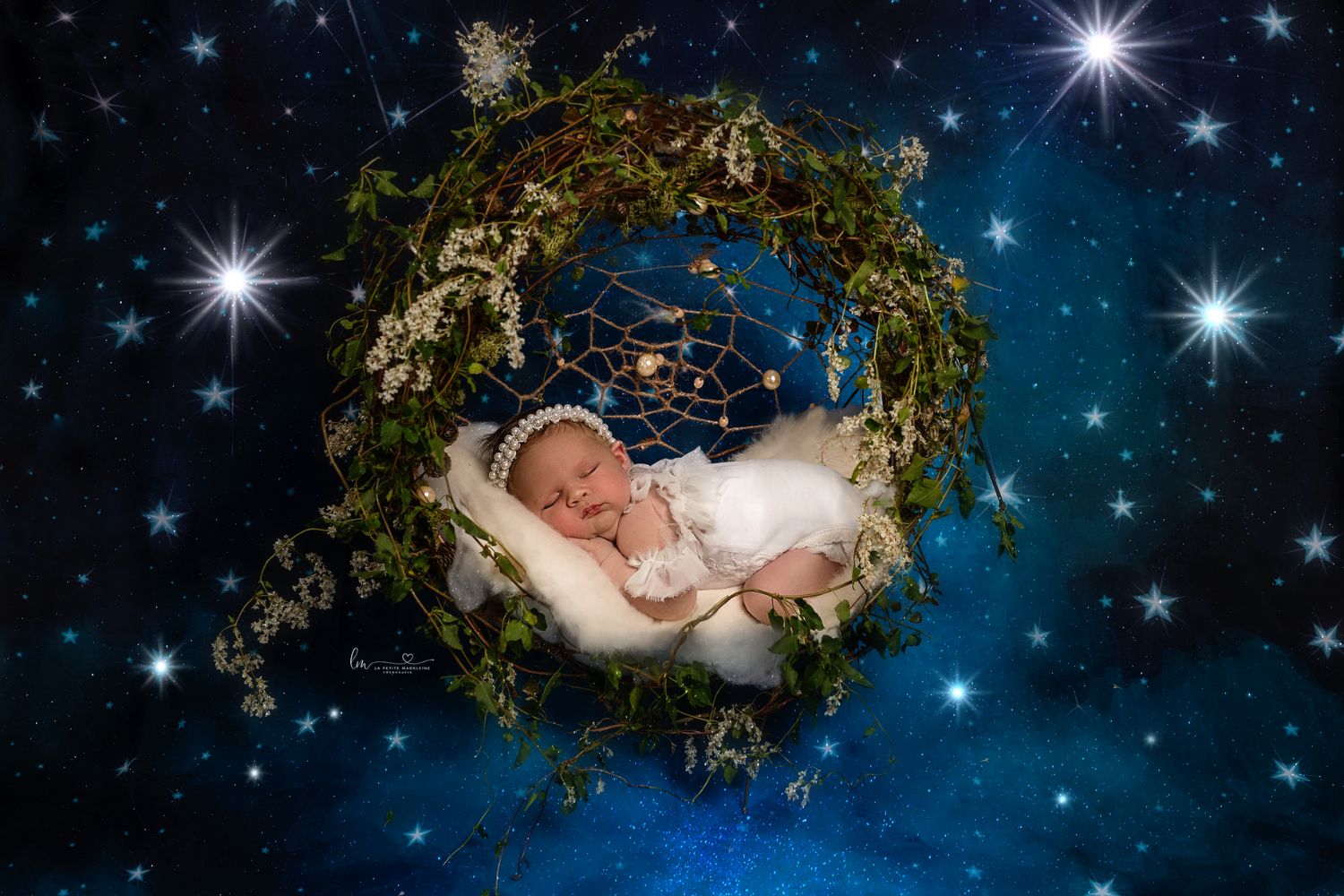 little baby lying on Christmas wreath