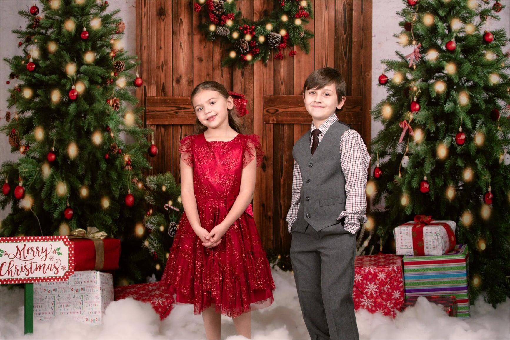 boy and girl Christmas photo with Kate Christmas Tree Wreath Backdrop Snow Winter Designed by Emetselch