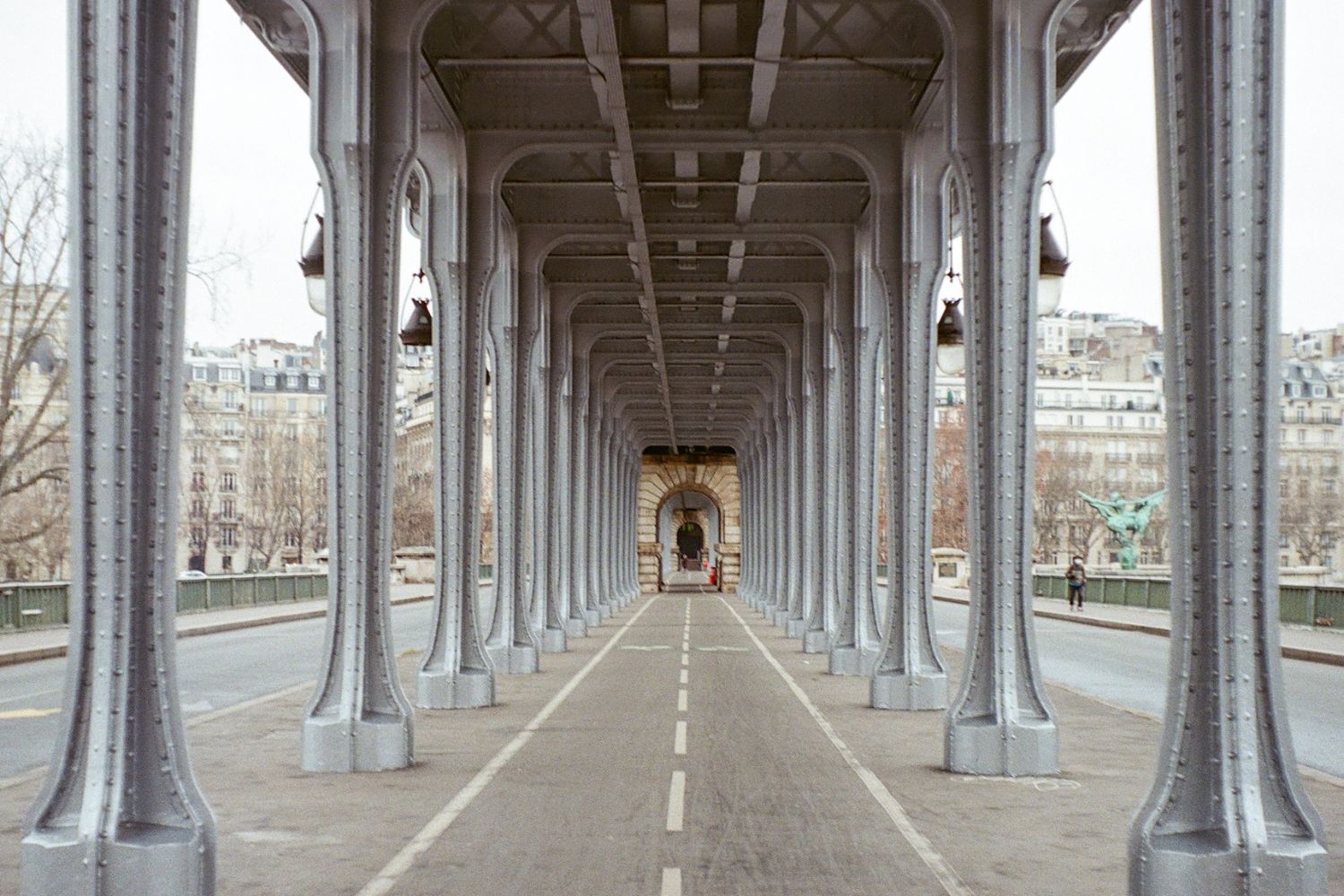 ryhthmic photo of gallery with multiple pillars