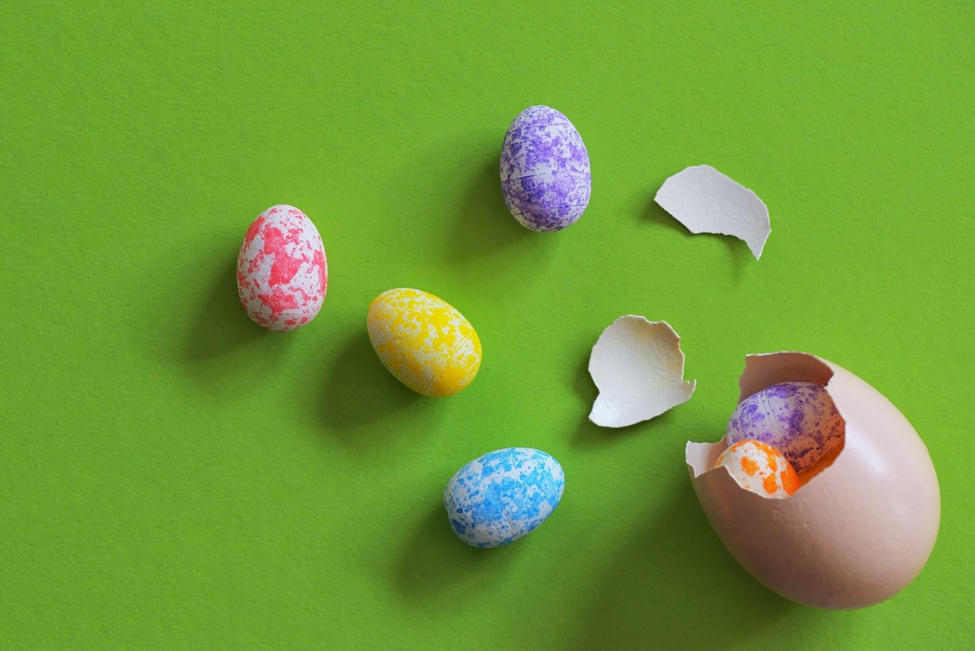 colorful Easter eggs scattering around 