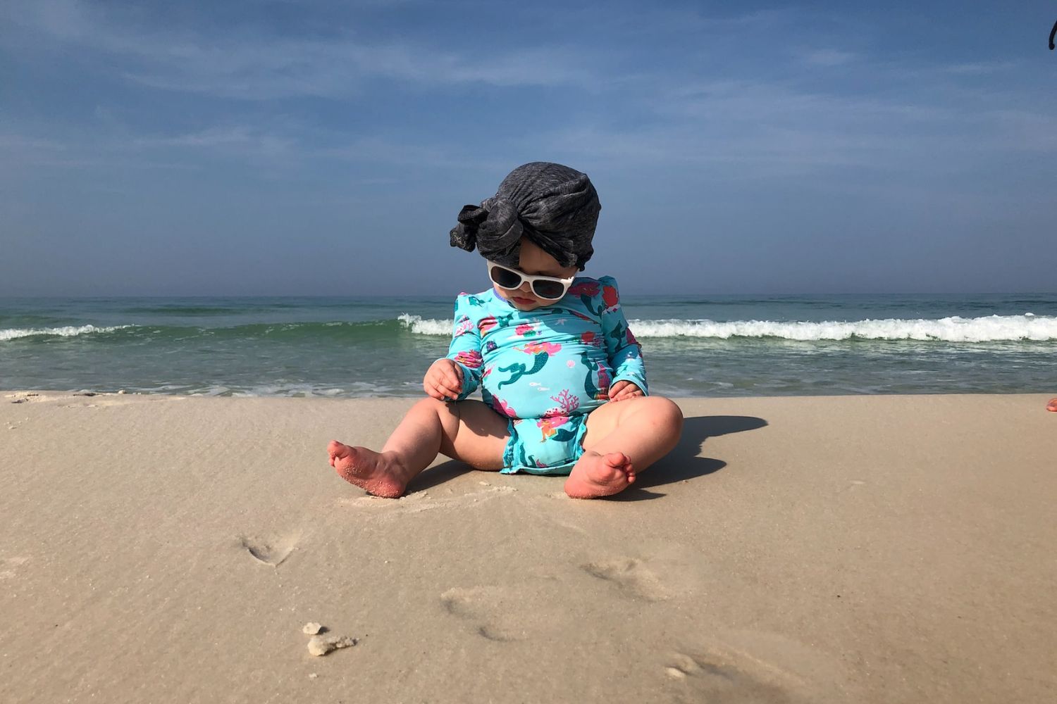 baby photo on the beach