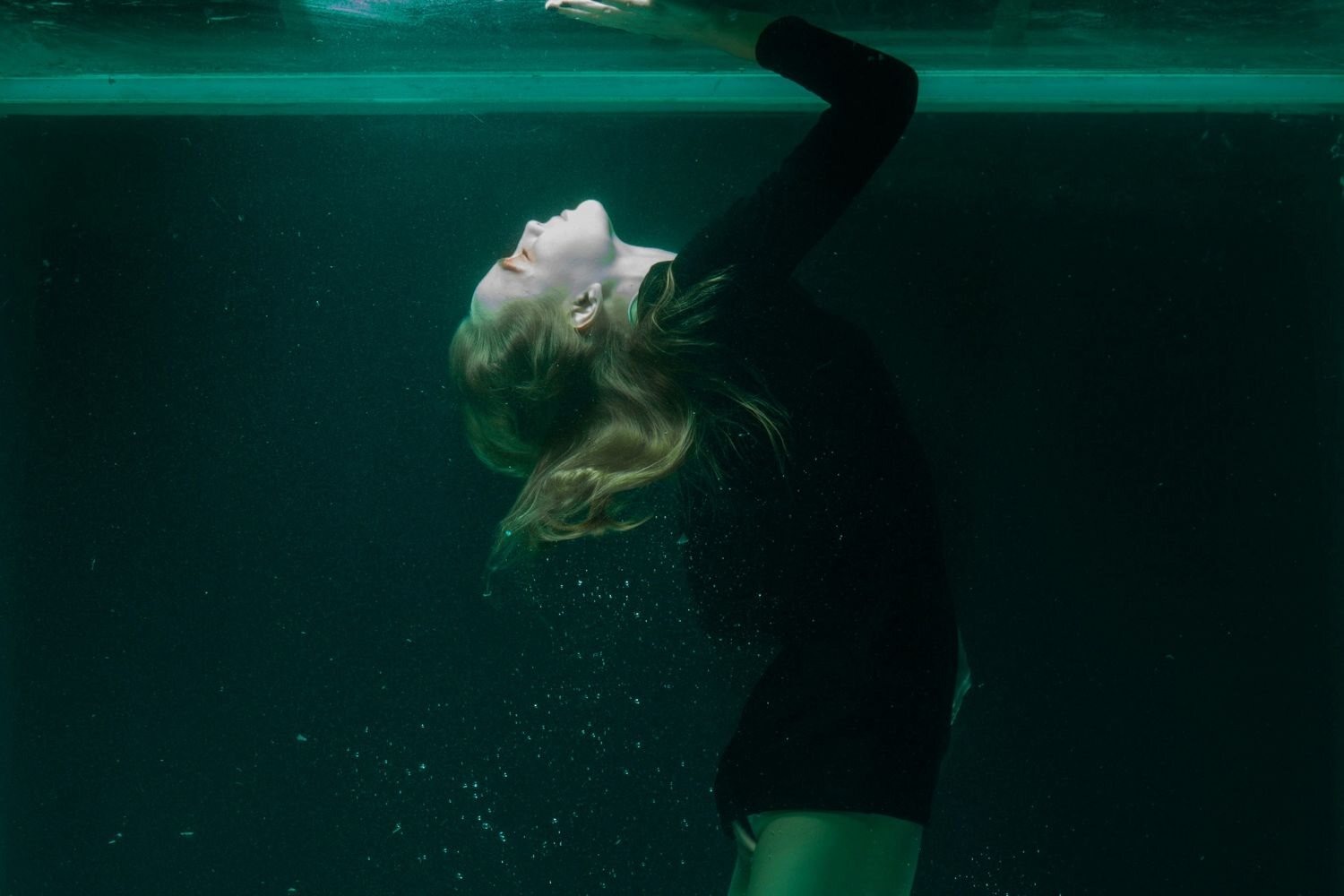 a selfie of a girl underwater