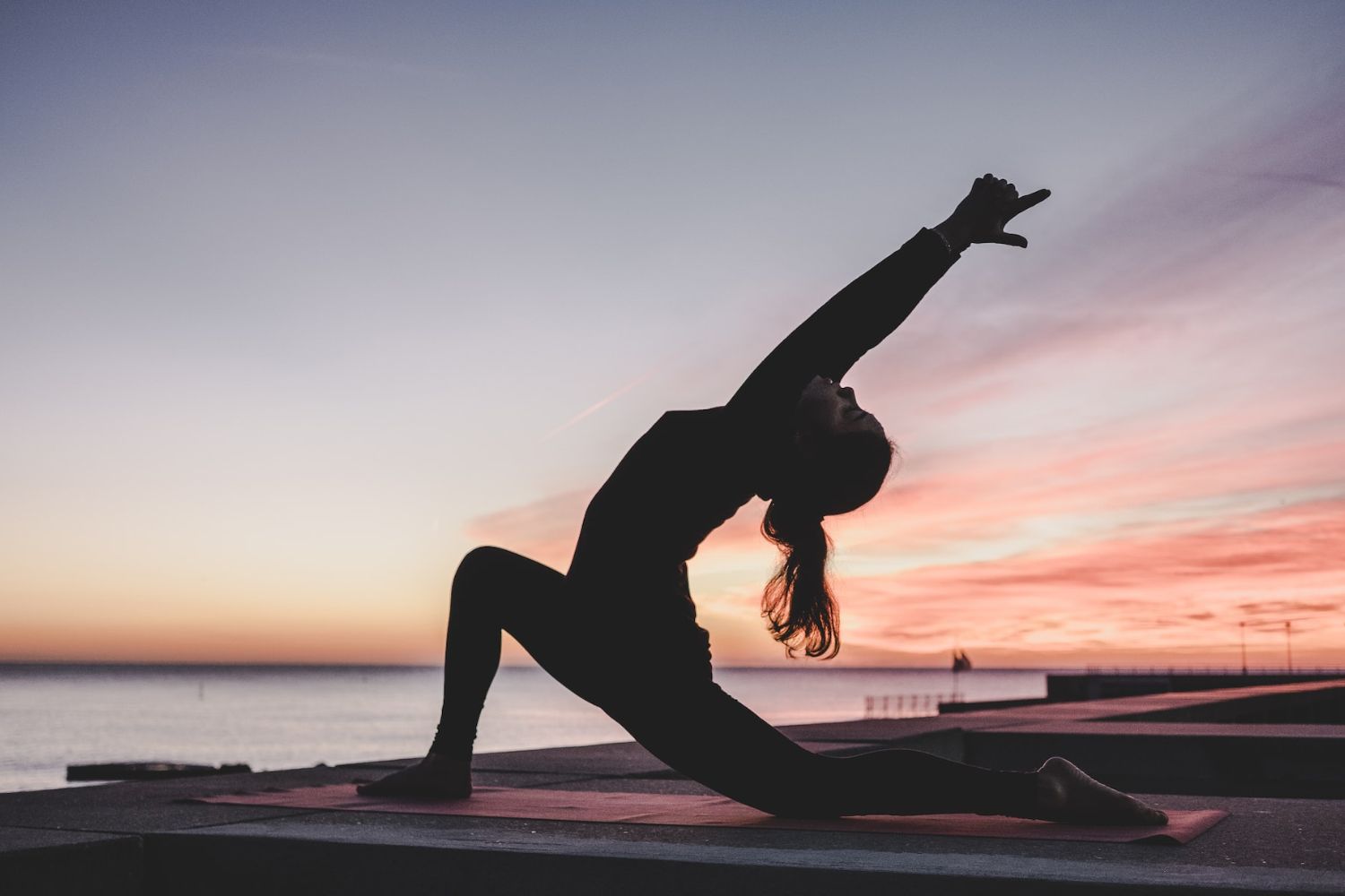 yoga girl on the beach