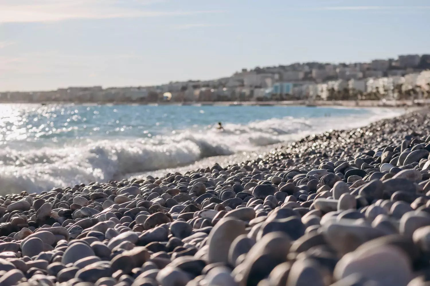 Cobblestones lay on the seashore