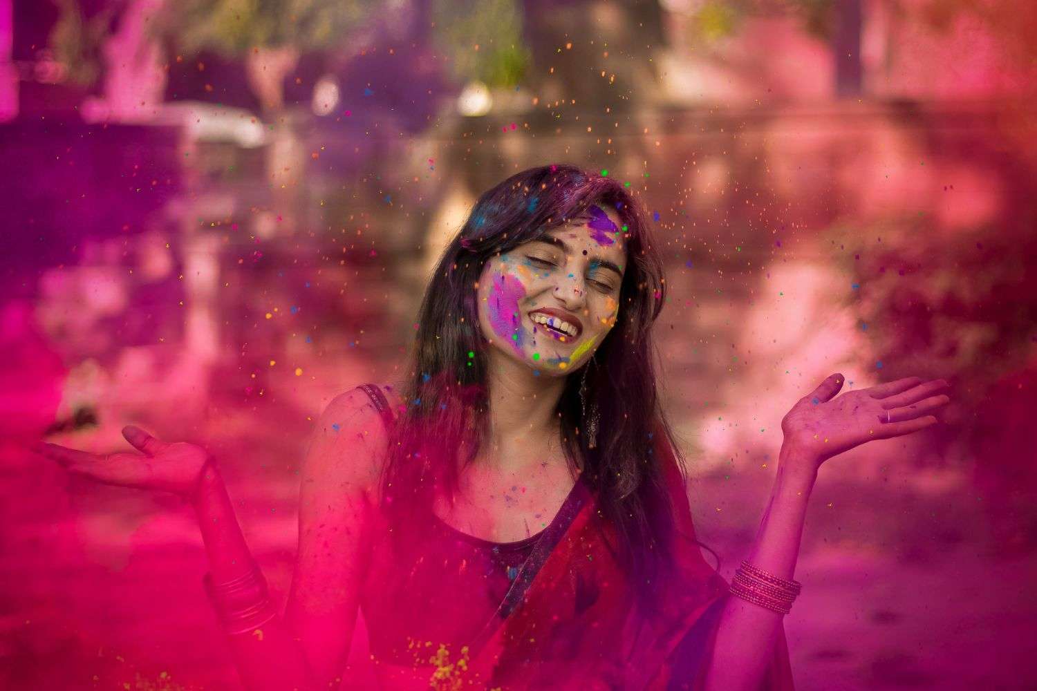 Image of A Group Of Young Girls Filled In Holi Colors and Taking A Selfie  In Smart Phone-ML355619-Picxy