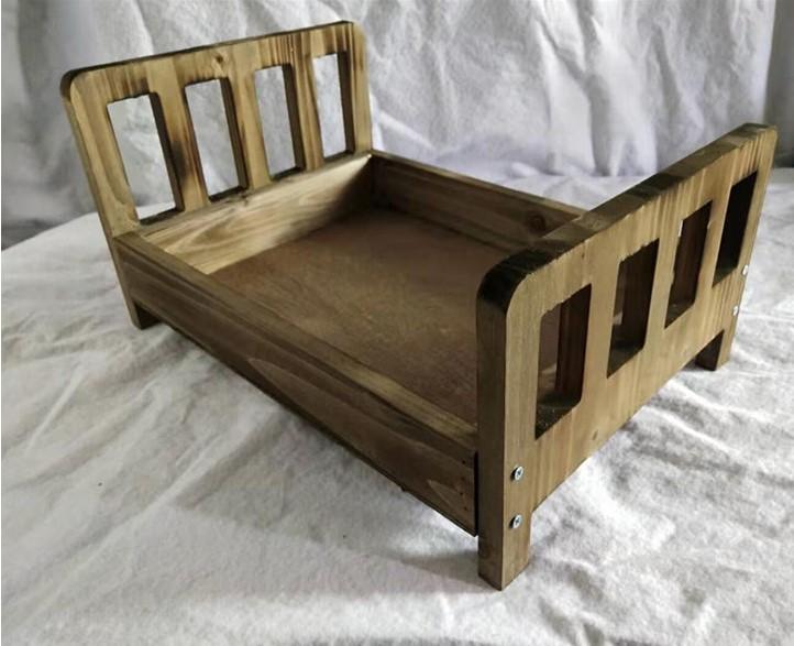 small wooden cot