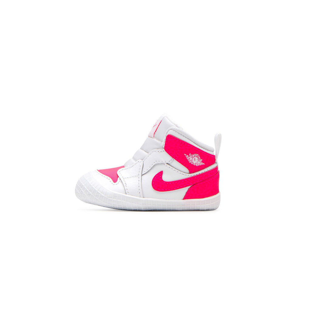 pink and white baby jordans