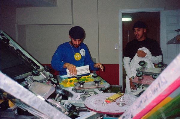 Osama and Ayman Abdeldayem at work in the Carpet Company factory, photo by Eyal Azrad - CSC, Cardiff Skateboard Club - UK Skate Store