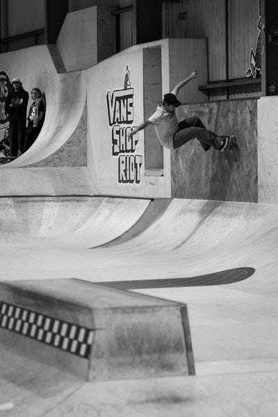 Jake Collins Frontside Wallride at Vans Shop Riot 2023, photo by Rob Whiston - CSC, Cardiff Skateboard Club - UK Skate Store