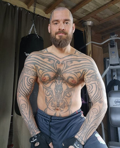 Philipp Tanzer topless with tattoos 