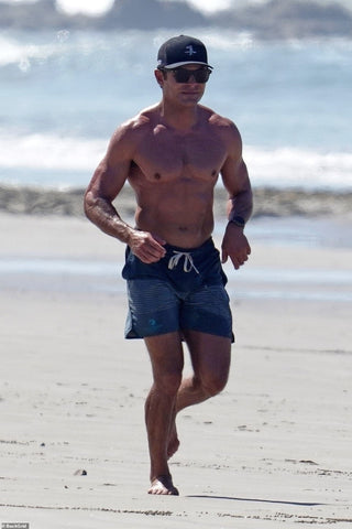 zac efron on the beach