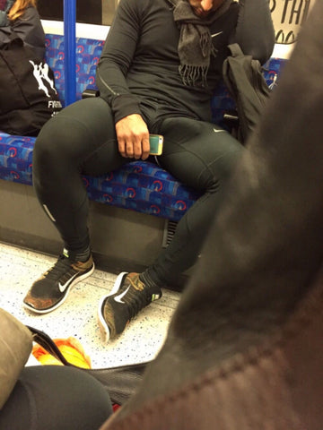 man asleep black leggings with bulge on london underground