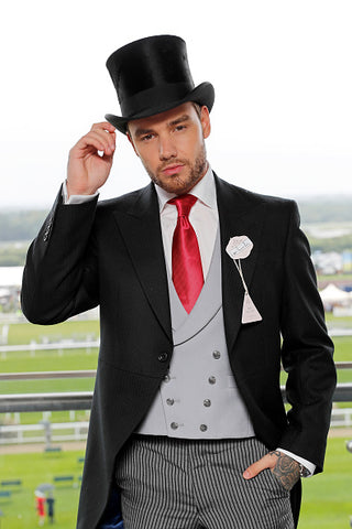 Liam Payne in top hat and tails 