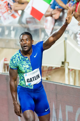 Justin Gatlin thanking his fans as he wins mens 100m race