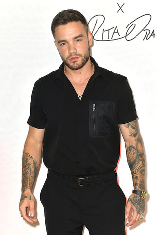 Liam Payne all in black short sleeves