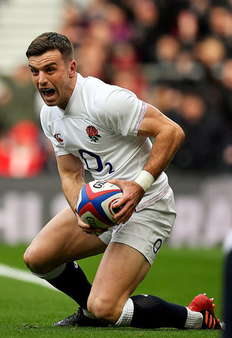  George Ford clutches ball muscly arms