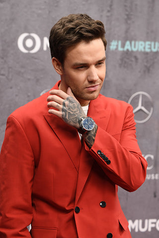 Liam Payne suited in red