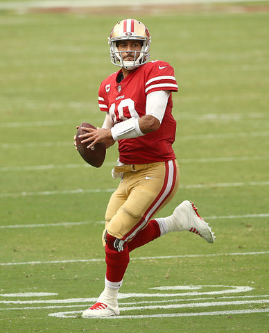 Jimmy Garoppolo wooly hat on pitch