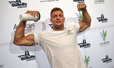 Rob Gronkowski flexing massive biceps