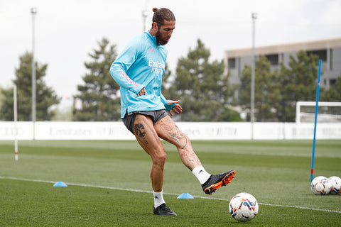 Sergio Ramos in light blue top and short shorts