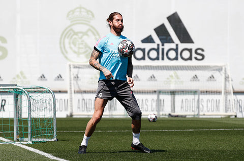 Sergio Ramos in light blue top and short shorts