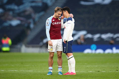 Jack Grealish chats with mate on opposing team 