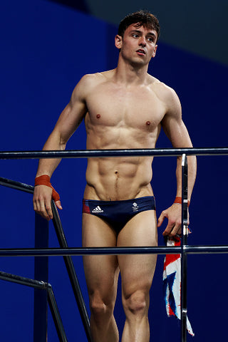 Tom Daley muscles out tiny trunks