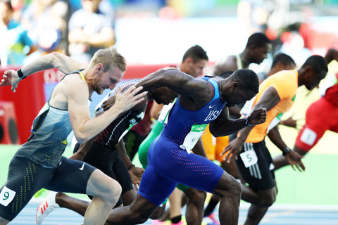 Justin Gatlin giving it everything he's got to win race against fellow olympians