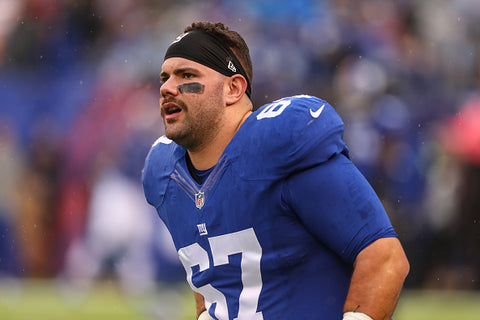 Justin Pugh blue top shoulder pads 