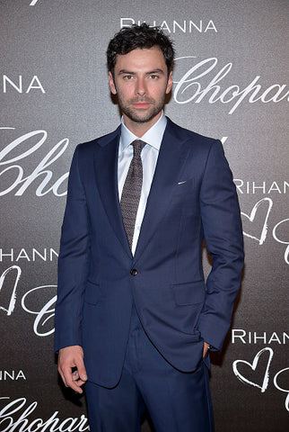 aiden turner in blue suit an tie