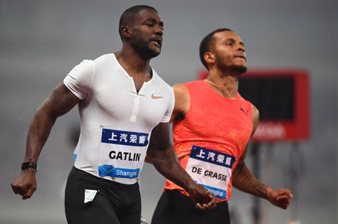 Justin Gatlin shows pectorals and nipples as he runs against De Graasse