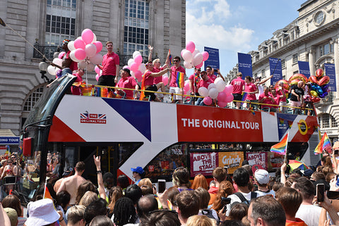 london bus and pride revellers