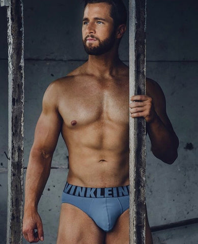 Matthew Bennett in blue trunks