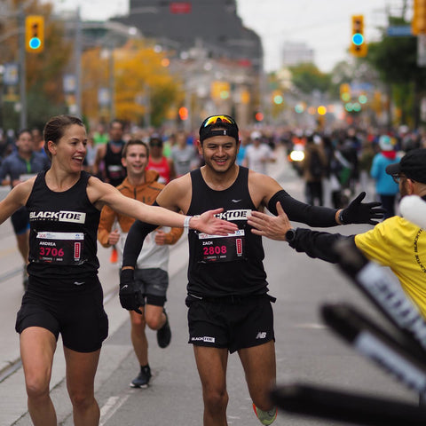 BlackToe runners getting a high five