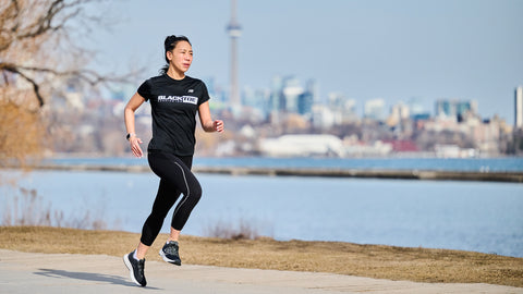 Runner outside in Toronto in a blacktoe tshirt