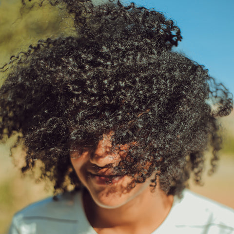 Curly Hair Woman Sun Exposure