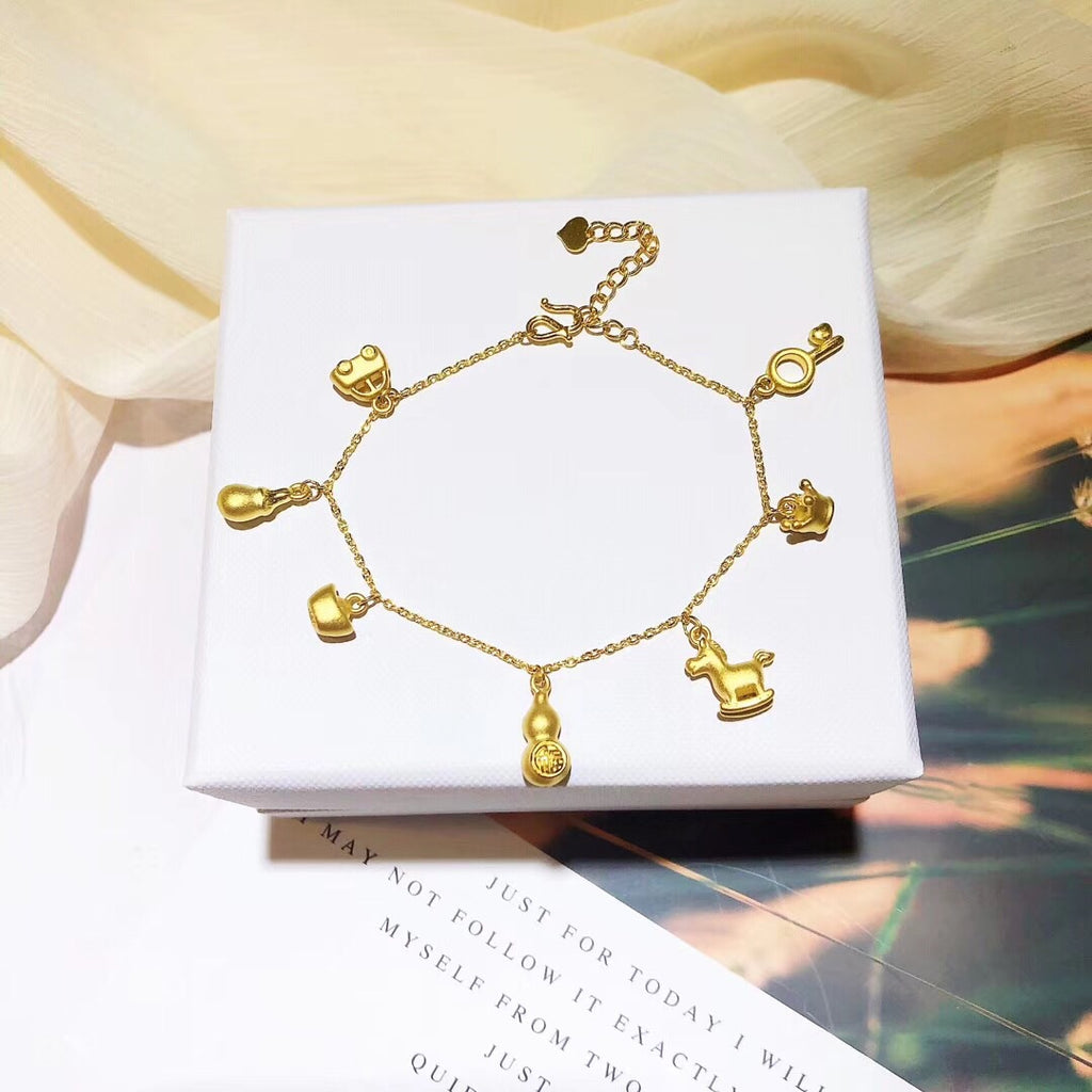 solid gold charm bracelet